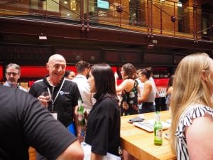 education recruitment agencies Search Associates ANZ teacher talking with Search Associates staff at one of the Melbourne fairs evening functions 