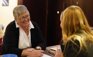 Support for your international school job search| Search Associates ANZ| Deidre Fischer talking with a candidate 