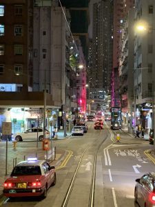 Age limits in international schools  Search Associates ANZ photo of a brightly lit street in Hong Kong in the evening hours