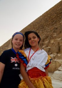 International school recruitment agencies Search Associates ANZ two young girls smiling at the base of one of the pyramids in Egypt 