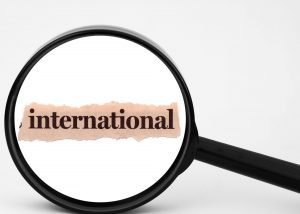 international schools and international mindedness Search Associates ANZ a magnifying glass hovering over the word international 