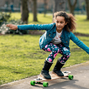International teachers and non-teaching partners Search Associates ANZ young girl riding her skateboard in the park 